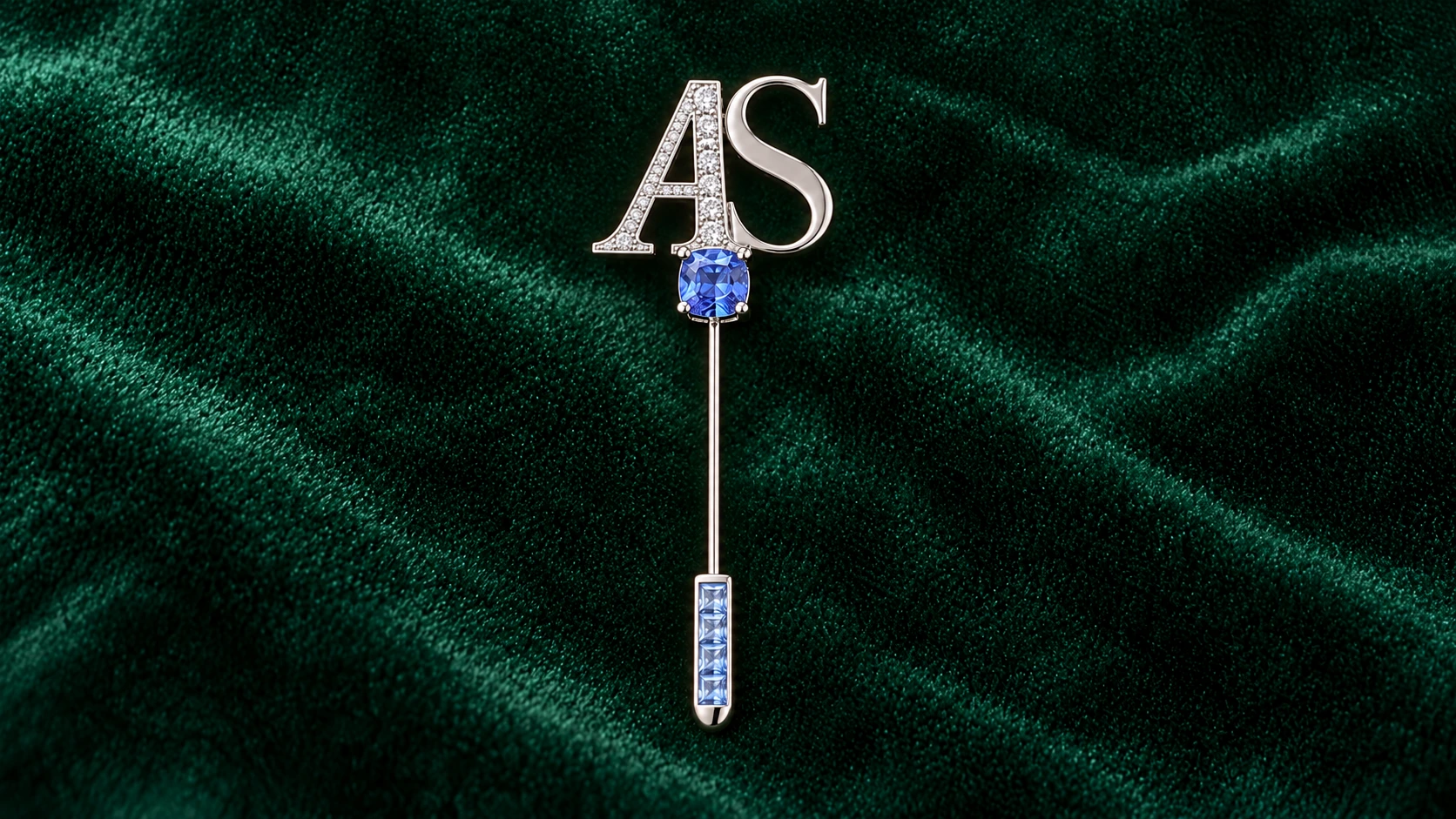 An anniversary monogram brooch