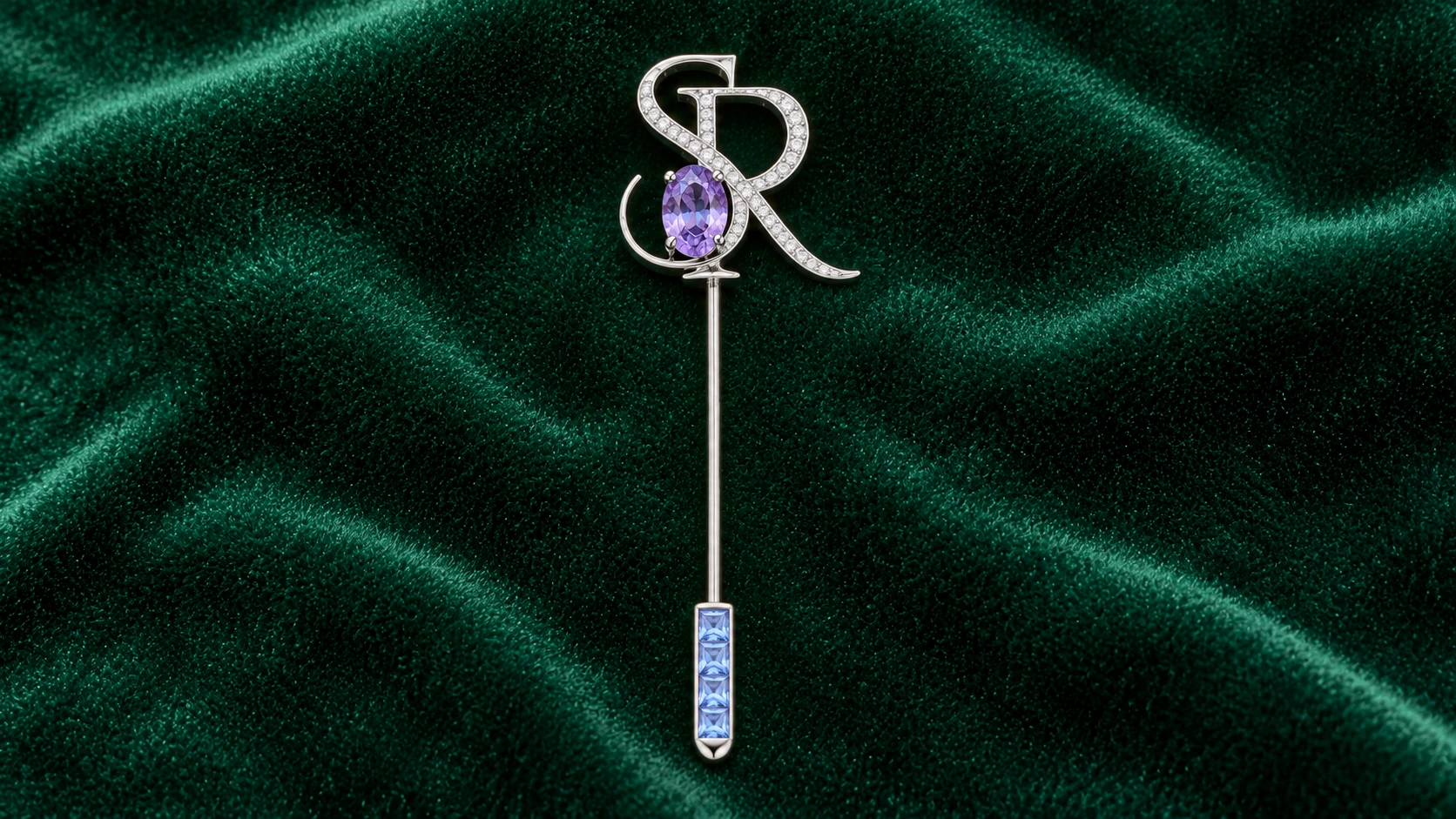 Bespoke monogram brooch on emerald velvet