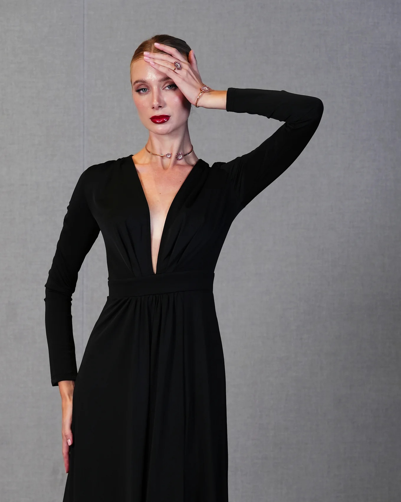 Model wearing the rose gemstone jewelry set from the Editorial Collection